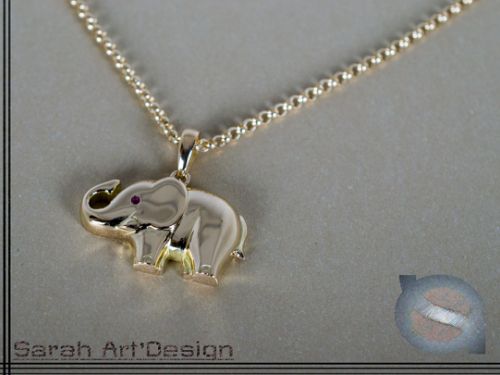 pendentif éléphant or jaune rubis